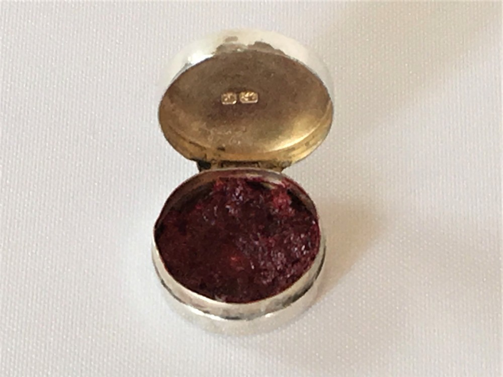 A diminutive Edwardian silver rouge pot View II