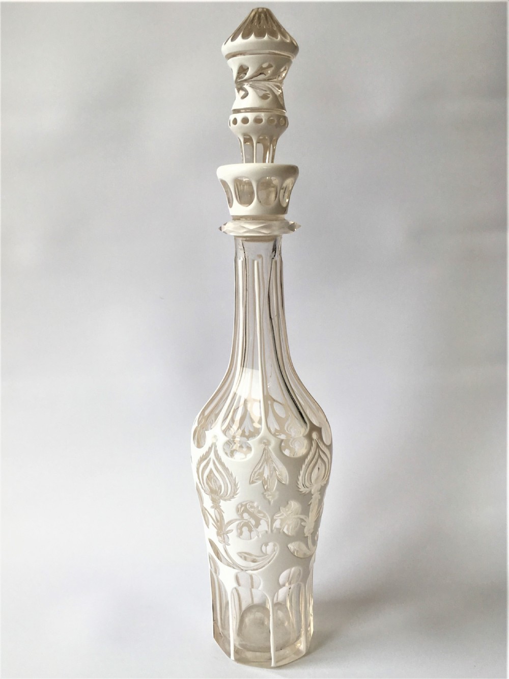 A fabulous Victorian white overlay decanter