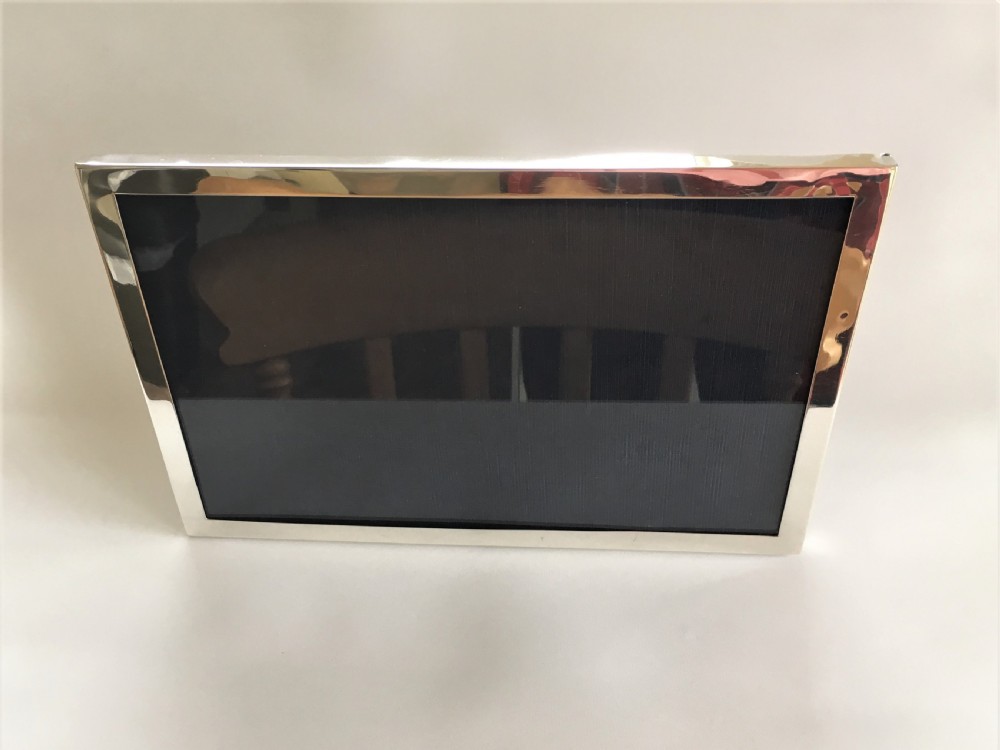 A large George V silver landscape photo frame View III