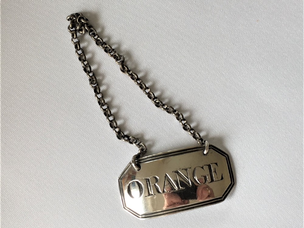 A rare Georgian silver 'Orange' decanter label