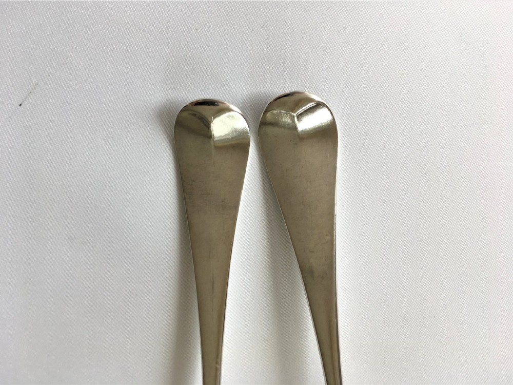A fabulous pair of mid 18th Century silver serving spoons View III