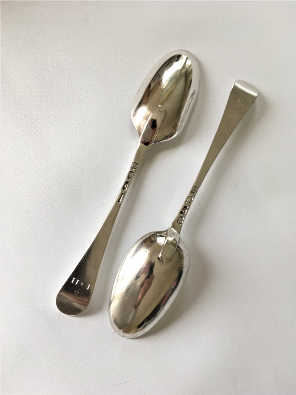A fabulous pair of mid 18th Century silver serving spoons View IV