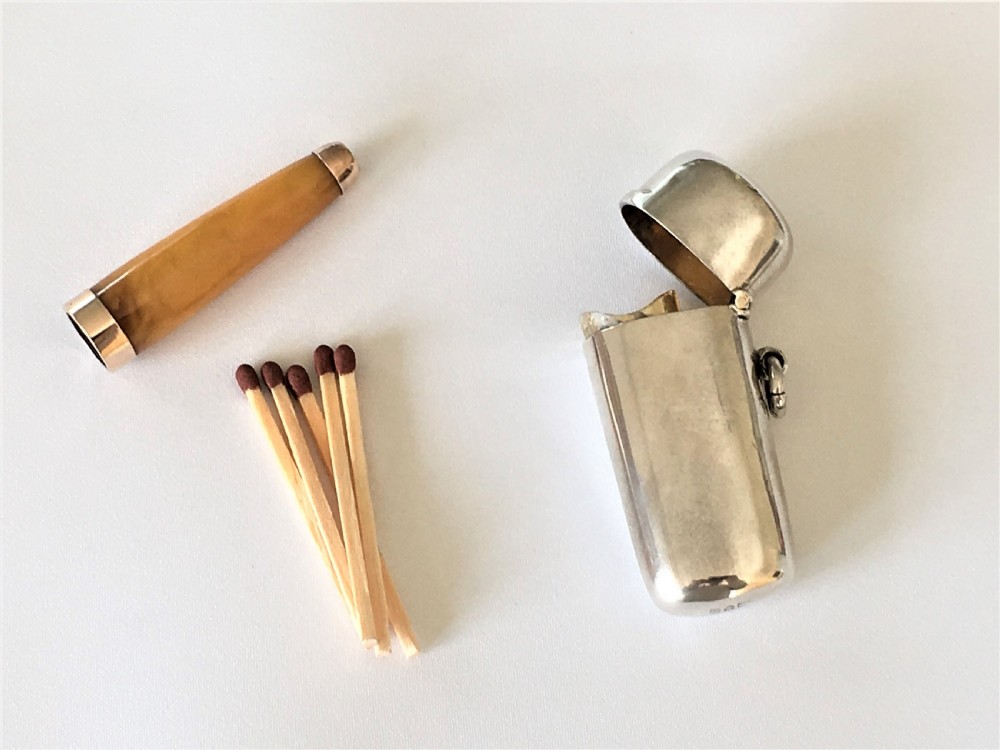 A gorgeous Asprey silver cheroot holder & match case View IV