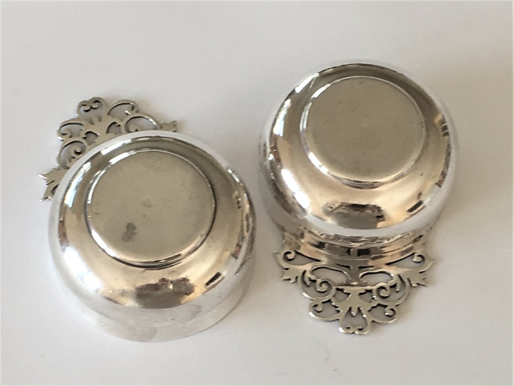 A pair of small silver Whisky tasters View V