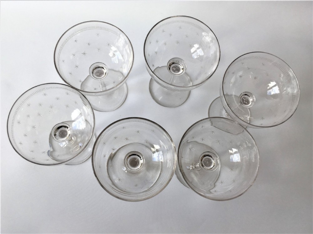 A set of six star etched champagne glasses View III