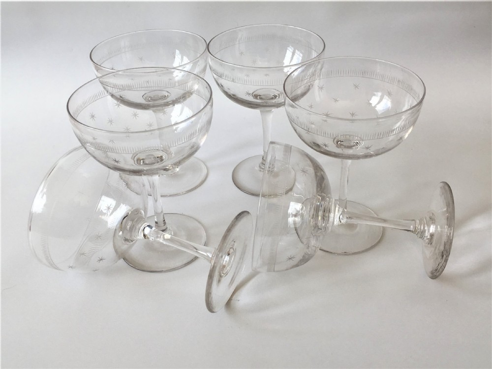A set of six star etched champagne glasses View V