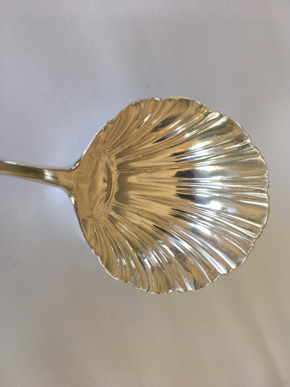 A superb 18th Century silver shell bowl soup ladle View IV