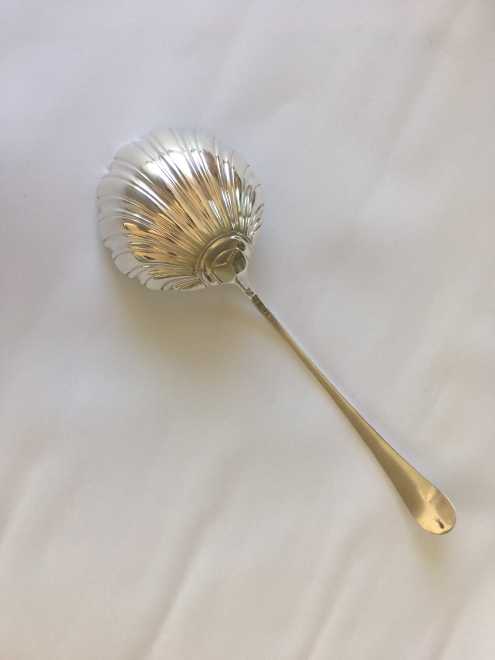 A superb 18th Century silver shell bowl soup ladle View VII