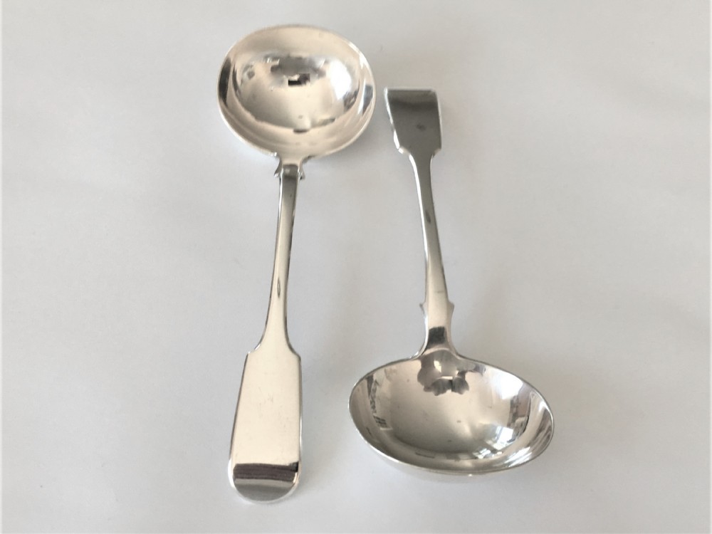 A fine pair of Victorian silver gravy ladles View II