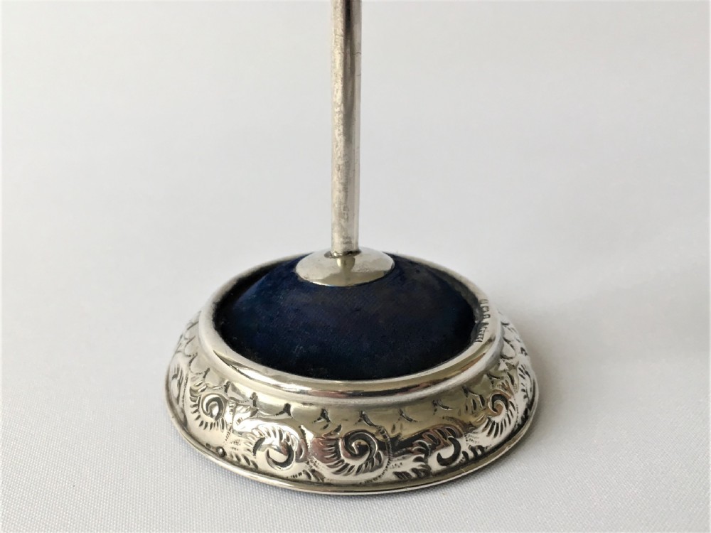 A collectable Edwardian silver hatpin/ring stand View III