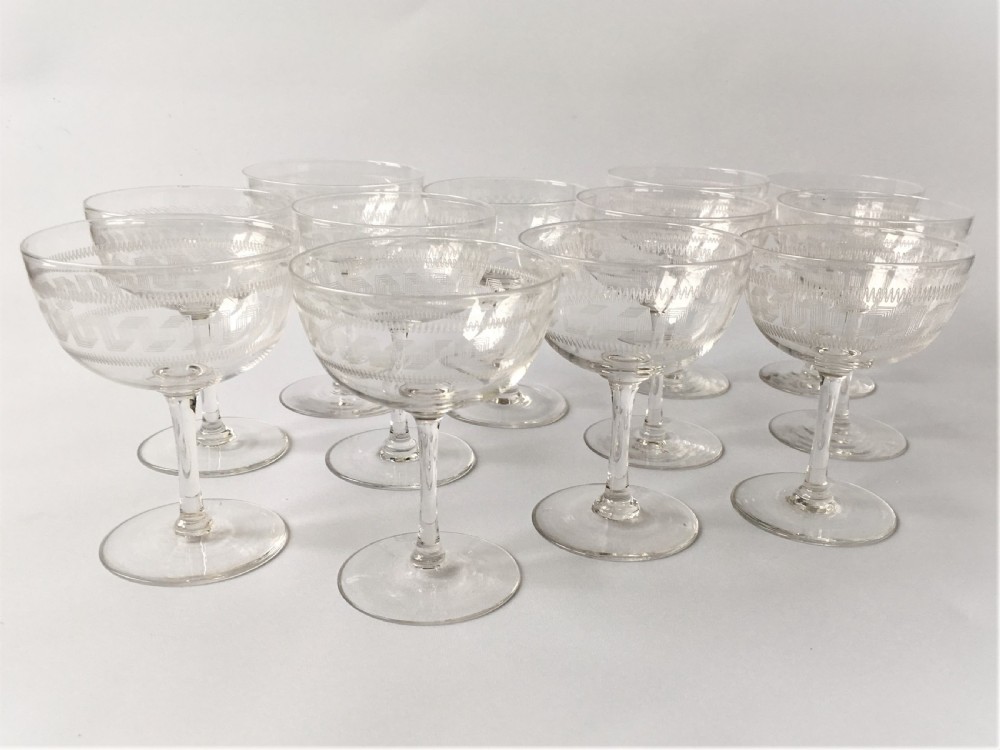A fine set of 12 Greek Key etched champagne bowls View IV