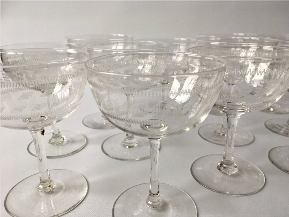A fine set of 12 Greek Key etched champagne bowls View V