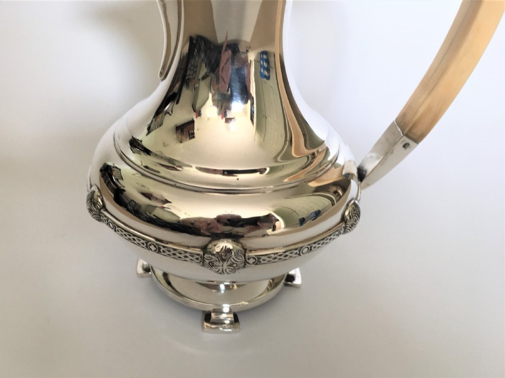 A superb Arts & Crafts silver coffee pot/hot water jug View V