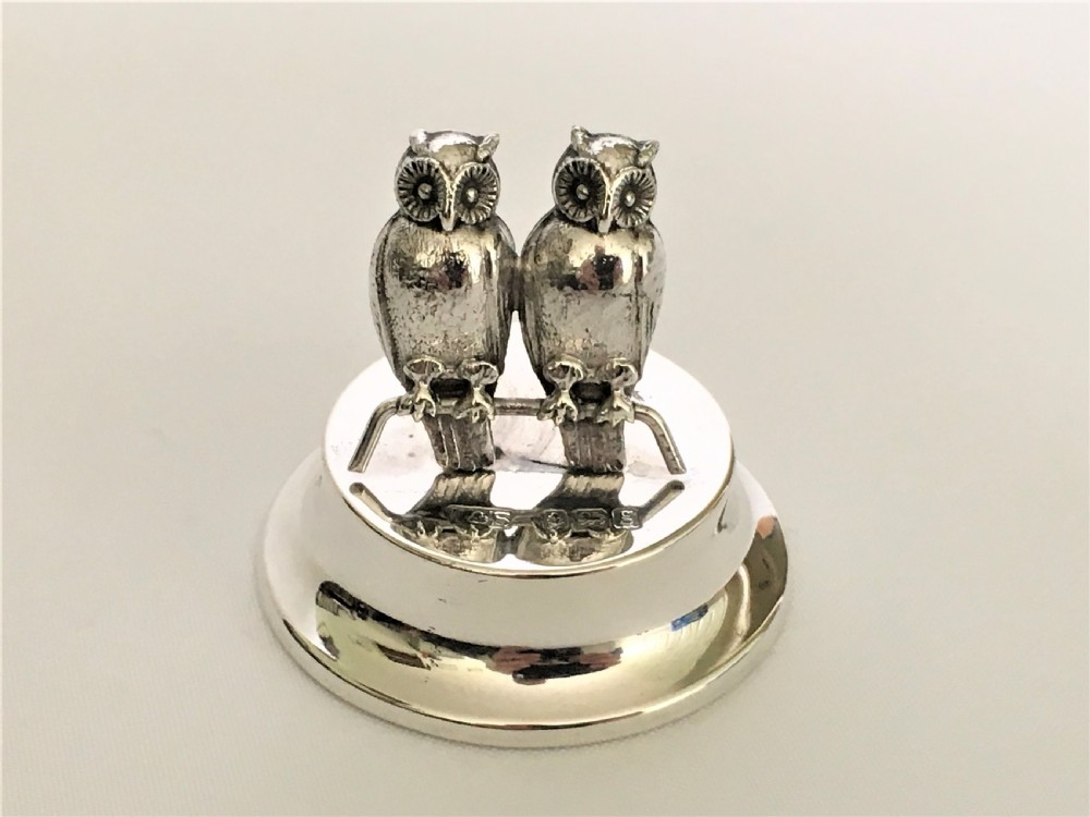 A gorgeous Edwardian silver twin owl card holder