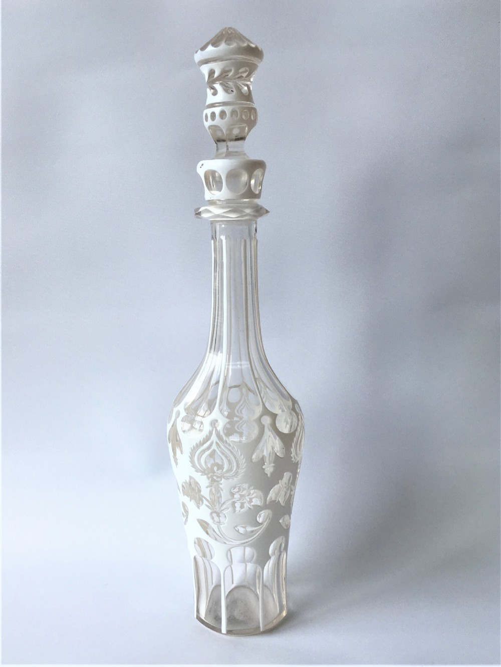 A fabulous mid Victorian overlay cut decanter