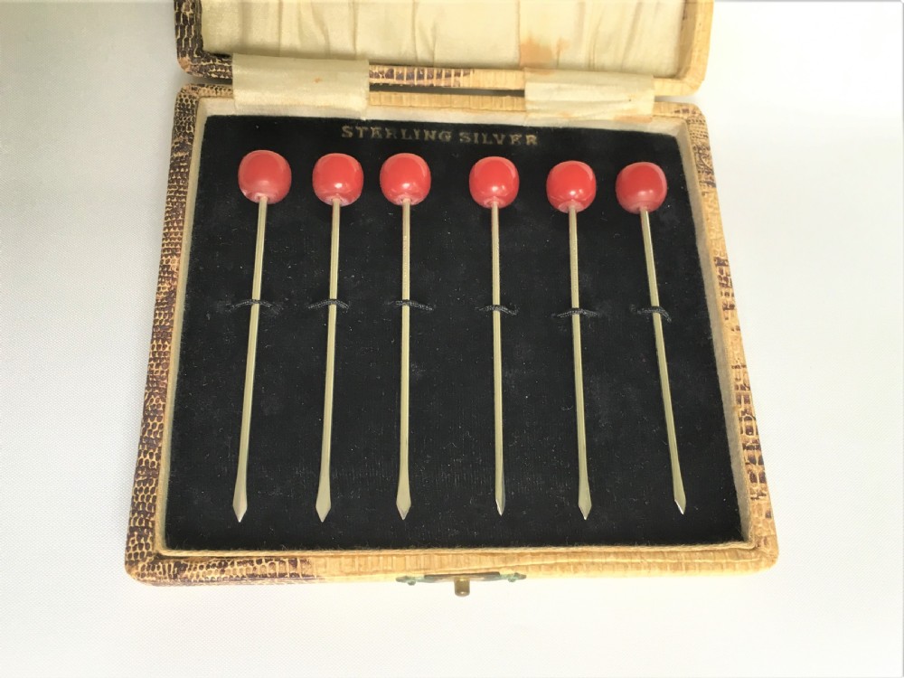 A charming set of six Sterling silver 'cherry' cocktail sticks View IV