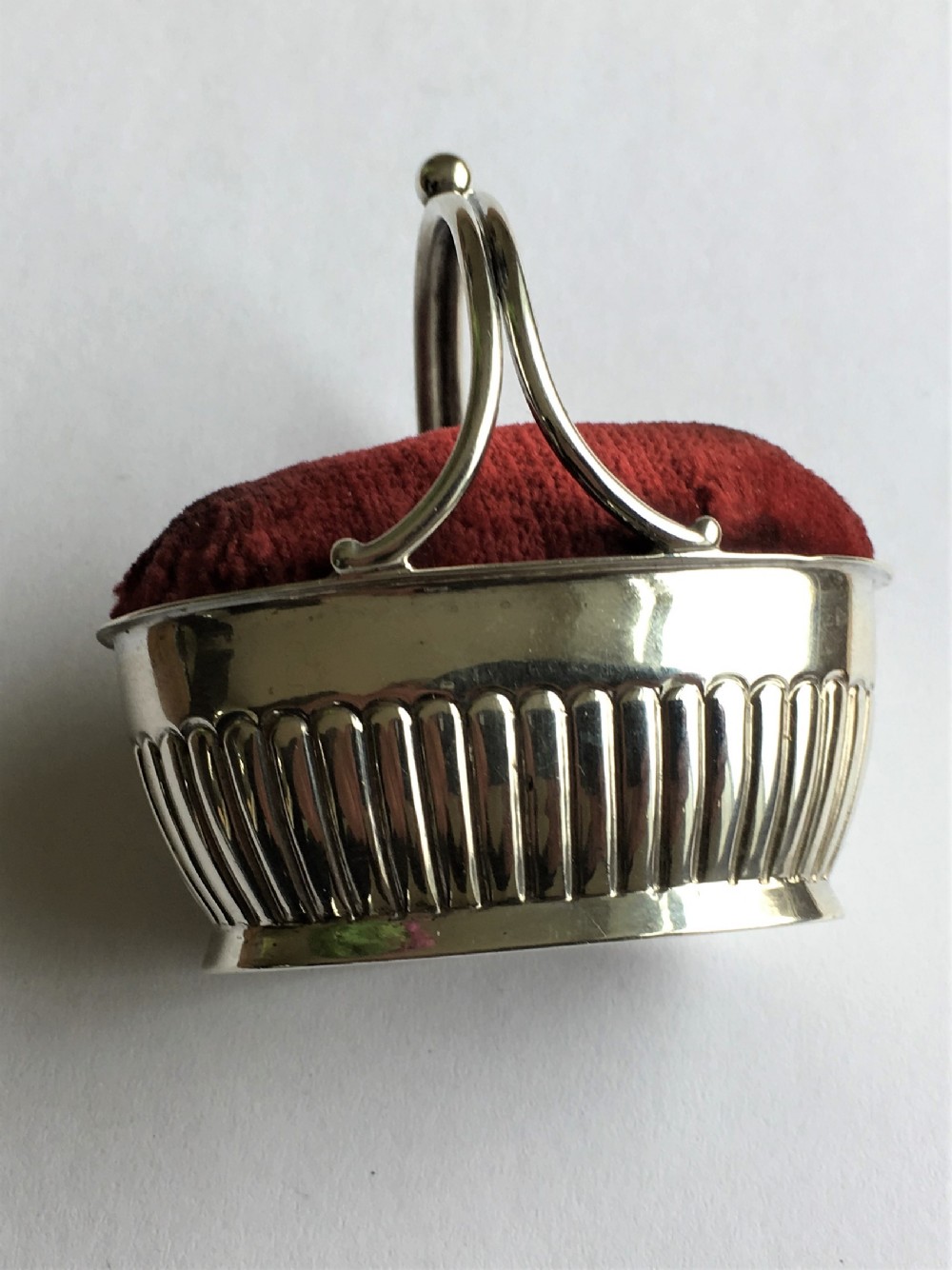 A quality Victorian novelty silver basket pin cushion