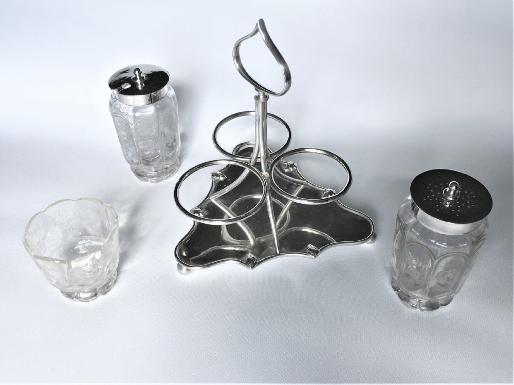 An attractive Edwardian silver three piece cruet set View IV