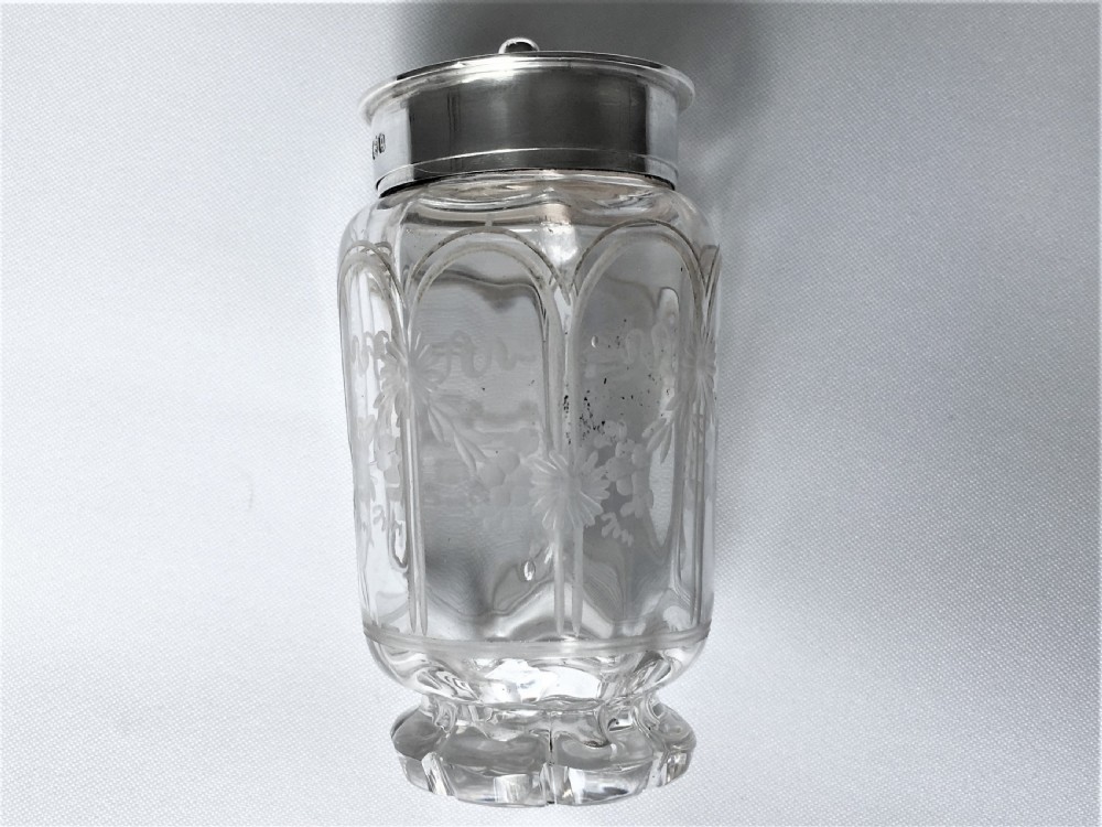 An attractive Edwardian silver three piece cruet set View V