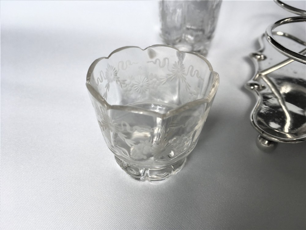 An attractive Edwardian silver three piece cruet set View VI