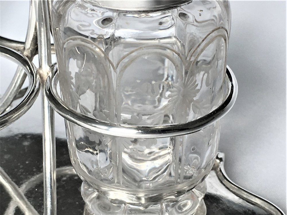 An attractive Edwardian silver three piece cruet set View VIII