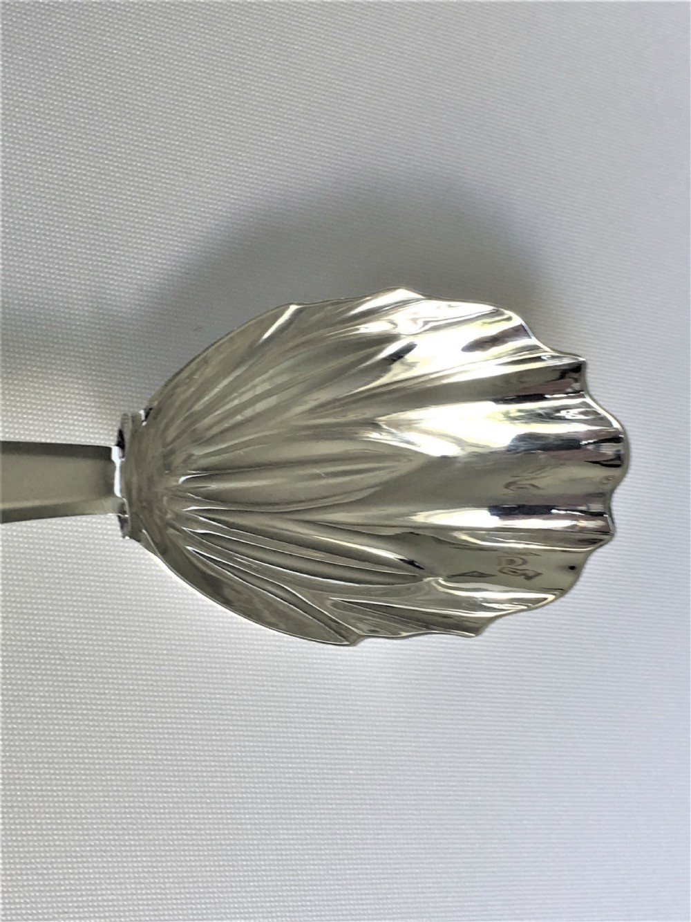A Georgian silver caddy spoon with stylised leaf bowl View II