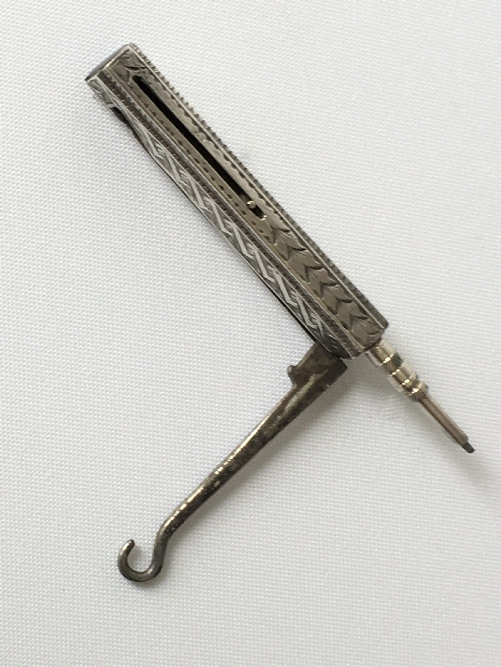 A charming Victorian silver buttonhook/pencil combo