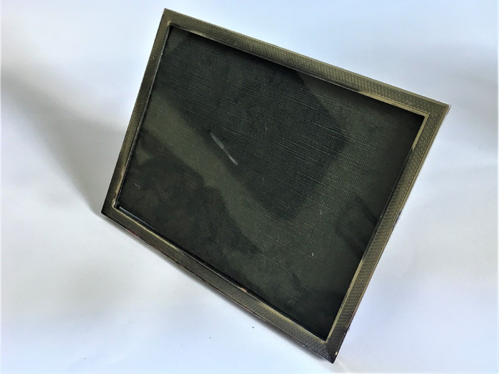An Art Deco silver landscape/portrait photo frame View II