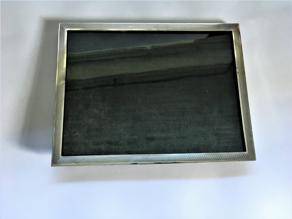 An Art Deco silver landscape/portrait photo frame View V