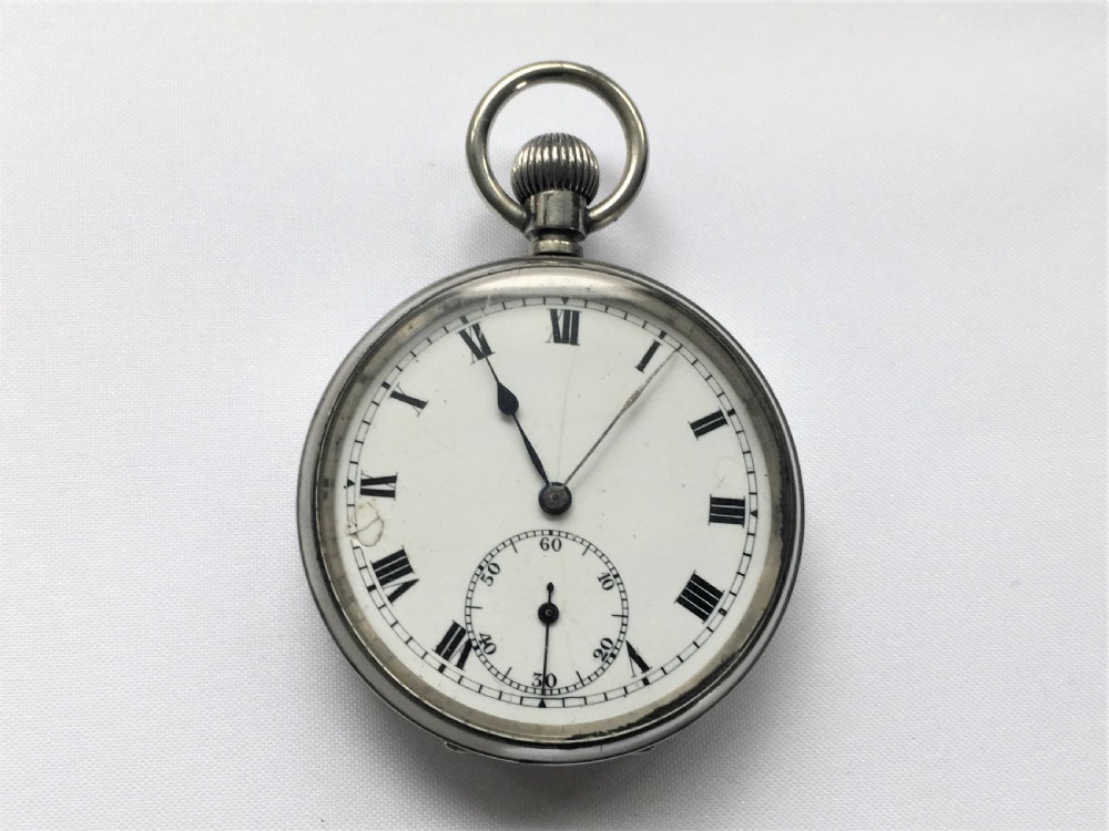 A silver case pocket watch/travelling clock View IV