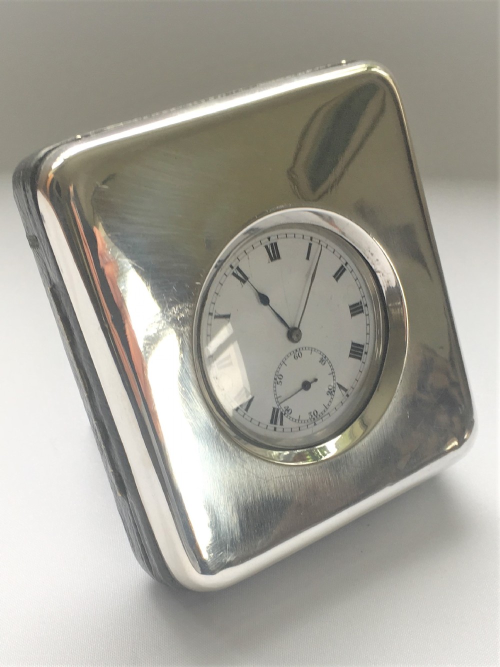 A silver case pocket watch/travelling clock