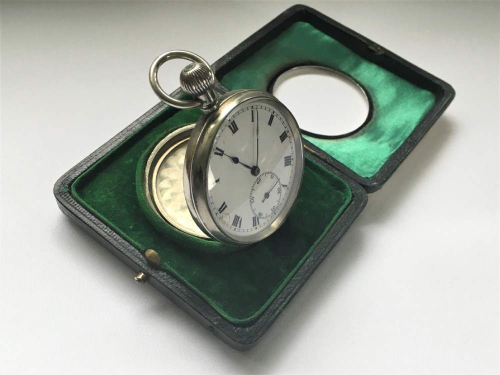 A silver case pocket watch/travelling clock View VIII