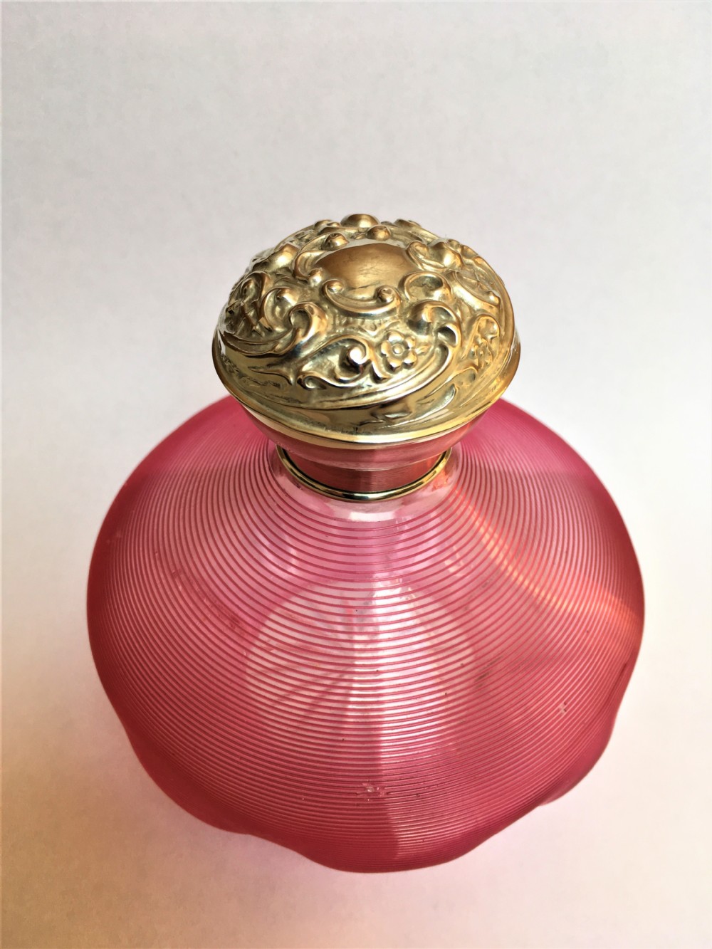 A fabulous Edwardian silver & cranberry thread cologne bottle View III
