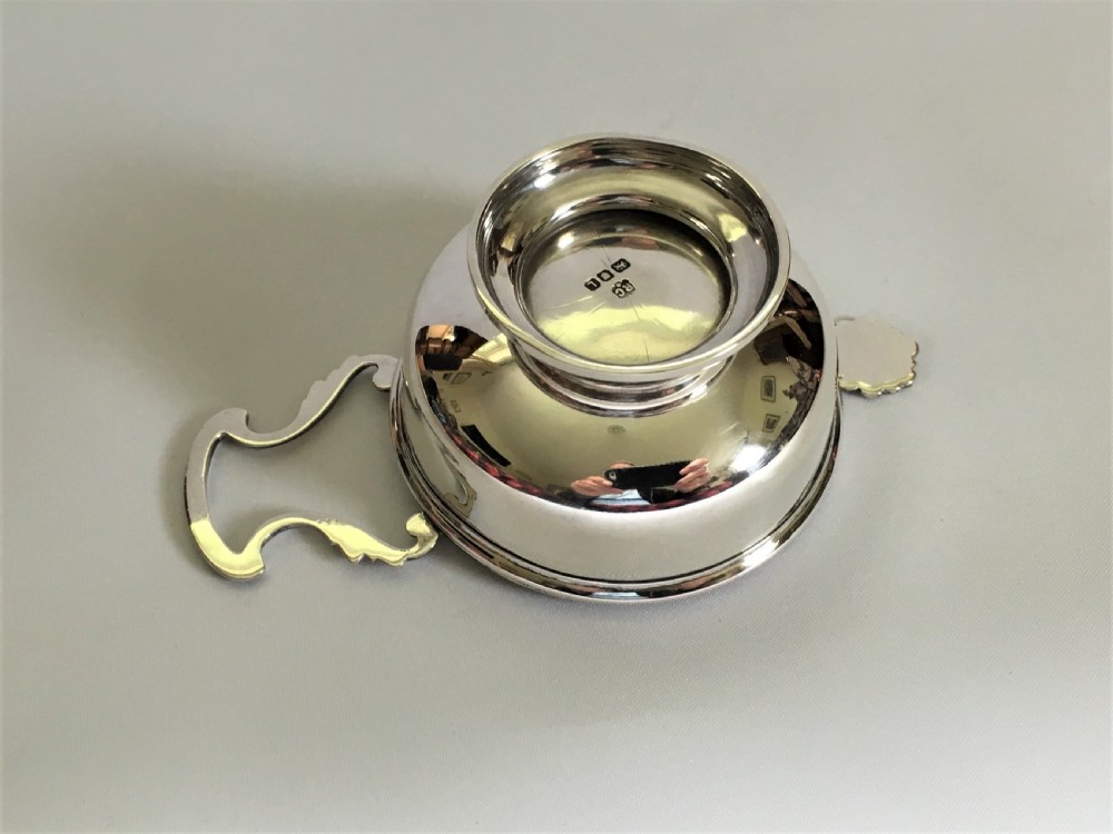  A William Comyns silver tea strainer & drip cup View VI