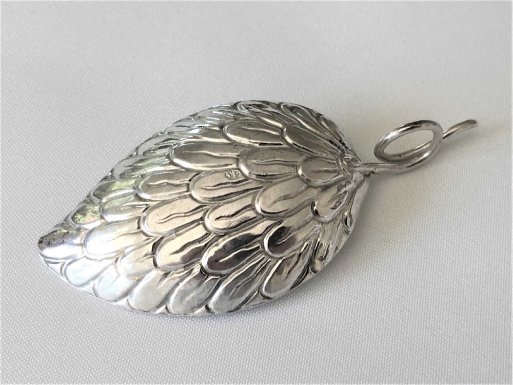 A gorgeous Georgian silver 'leaf' caddy spoon View V