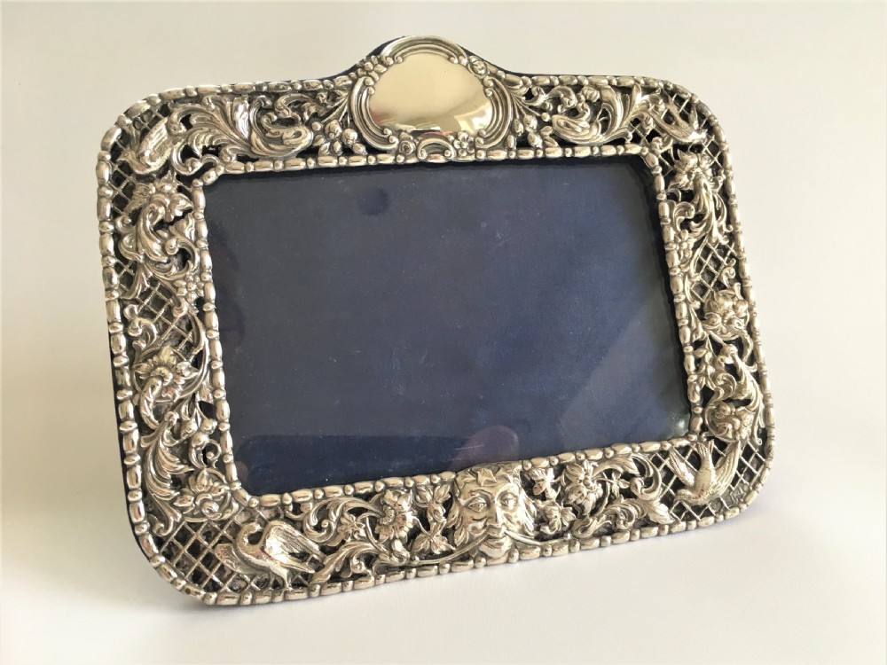 A superb pierced silver photo frame by William Comyns View II