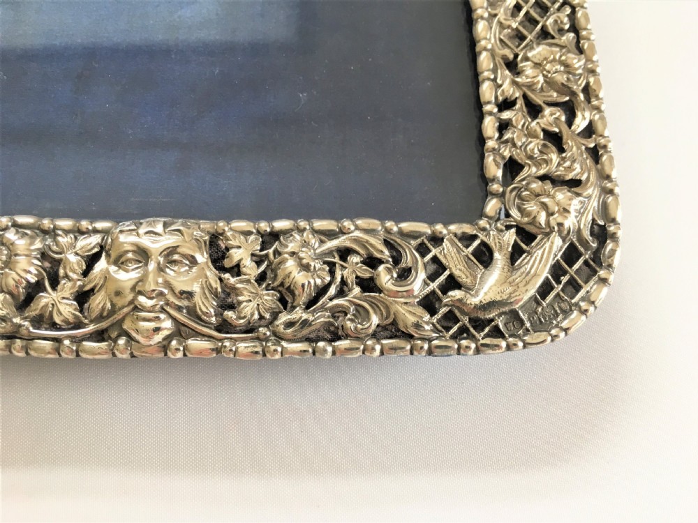 A superb pierced silver photo frame by William Comyns View V