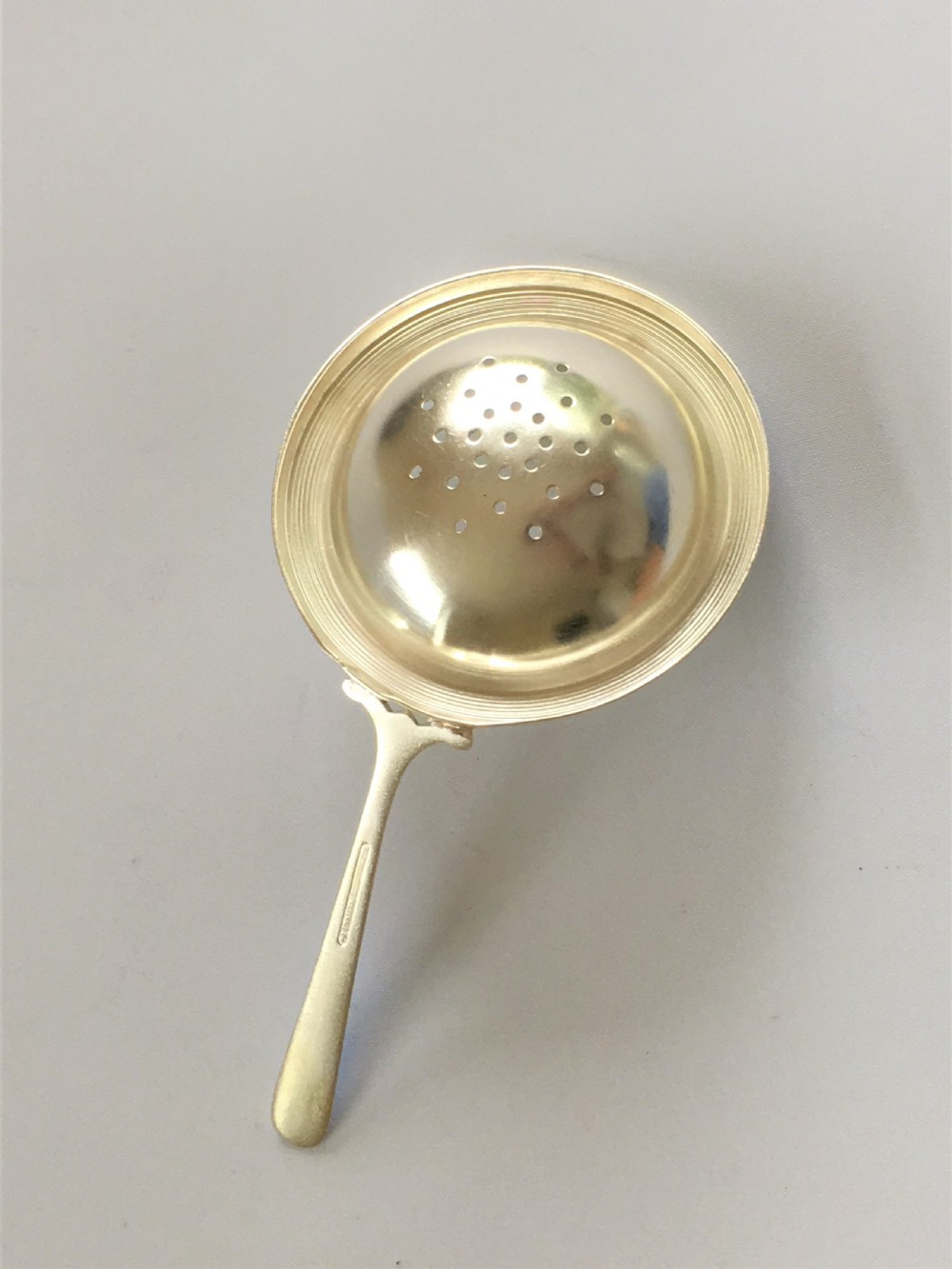A Scandinavian silver & guilloche enamel tea strainer  View IV