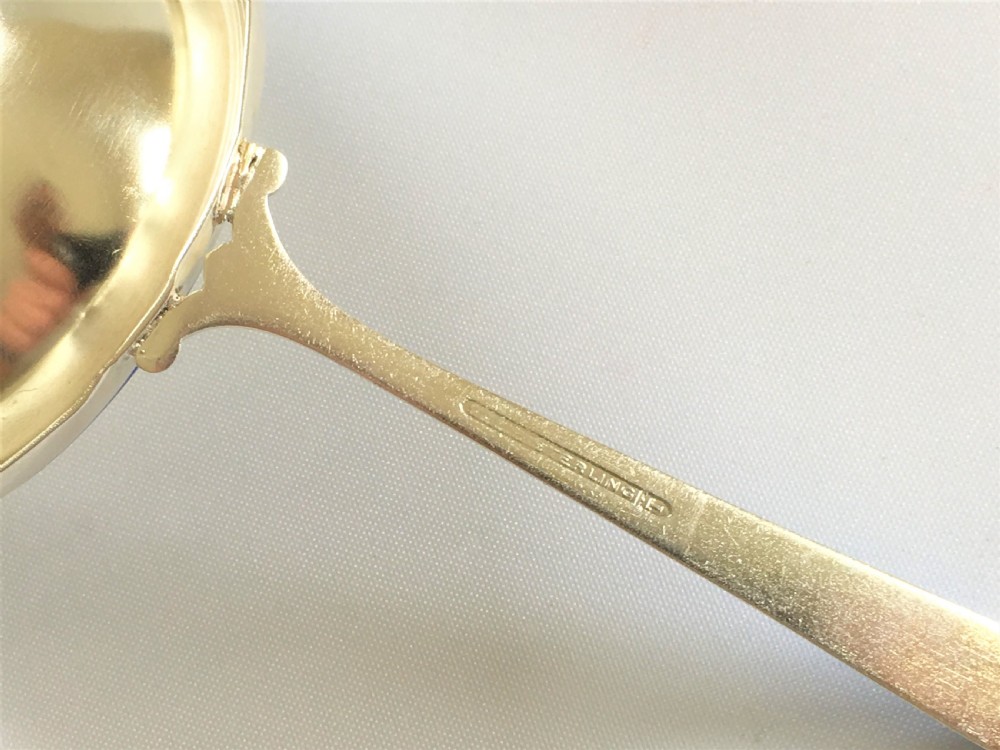 A Scandinavian silver & guilloche enamel tea strainer  View V