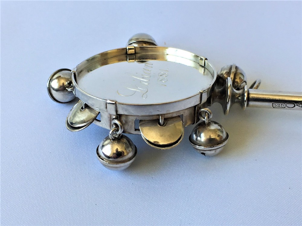 A rare Sterling silver novelty tambourine rattle/whistle combination View VI