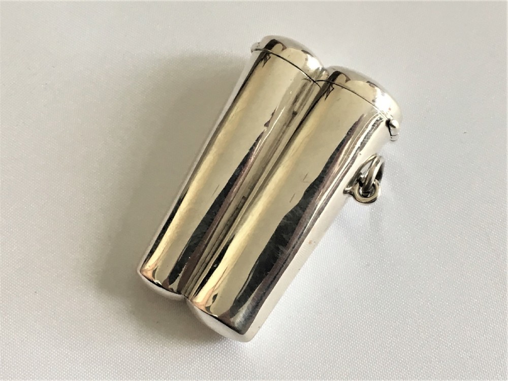 A rare Edwardian double cheroot case and holders