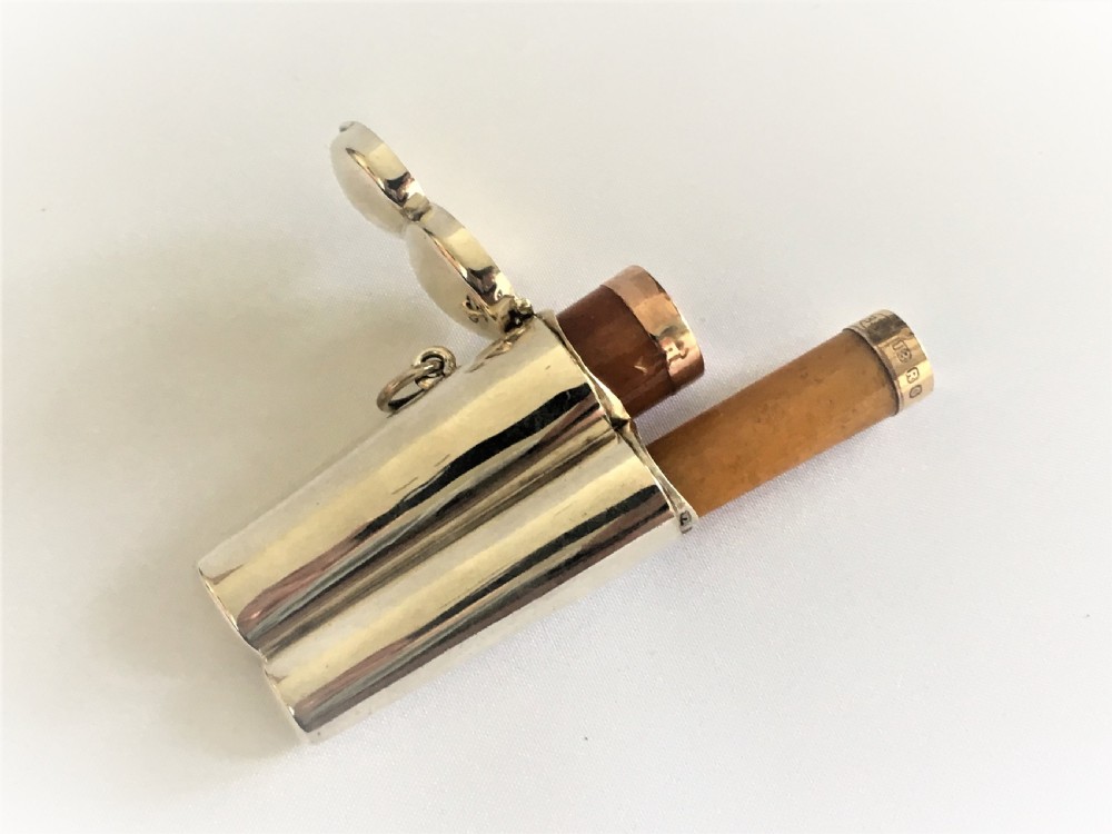 A rare Edwardian double cheroot case and holders View III