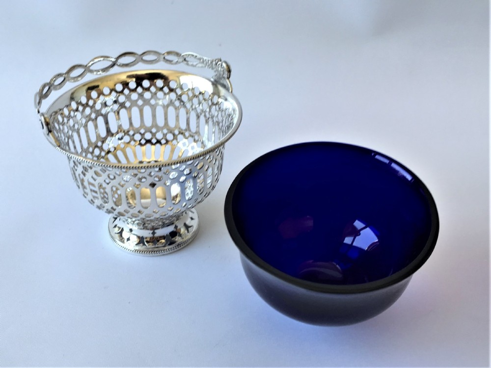 An Edwardian pierced silver swing handled bonbon basket View IV
