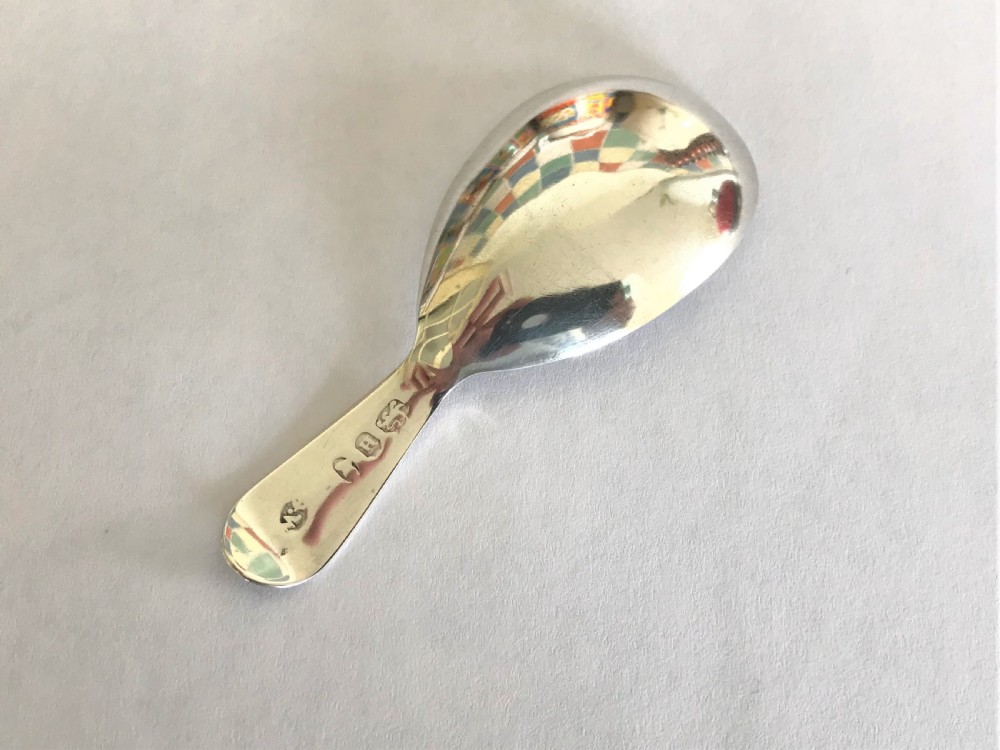 A lovely Georgian silver tea caddy spoon View V