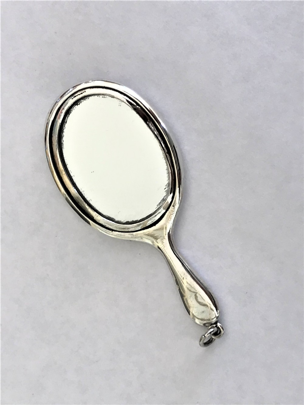 A silver Reynold Angels chatelaine mirror View IV