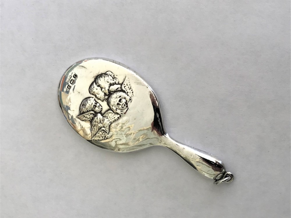 A silver Reynold Angels chatelaine mirror