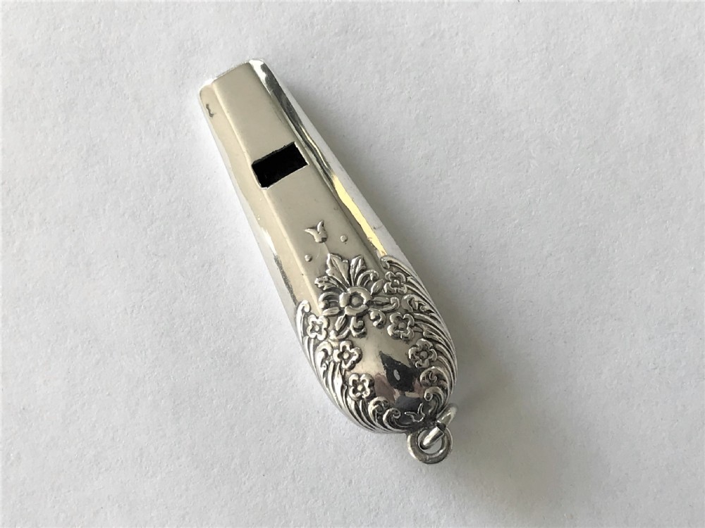 A gorgeous Chester silver dog whistle by Charles Horner