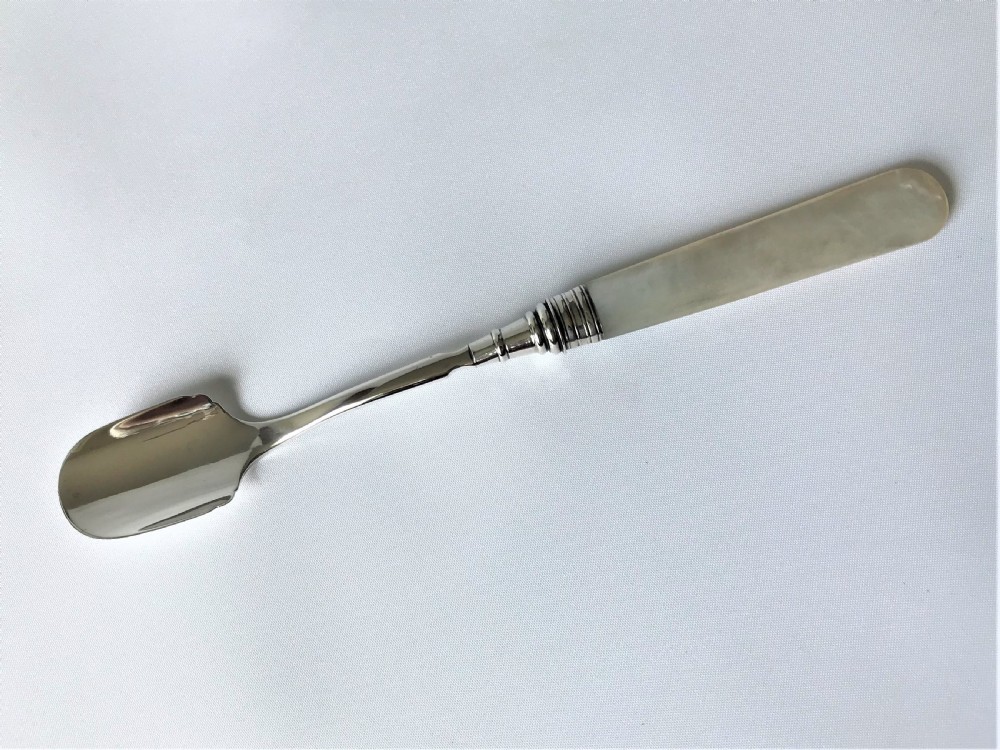 A rare Georgian silver & mother-of-pearl Stilton scoop