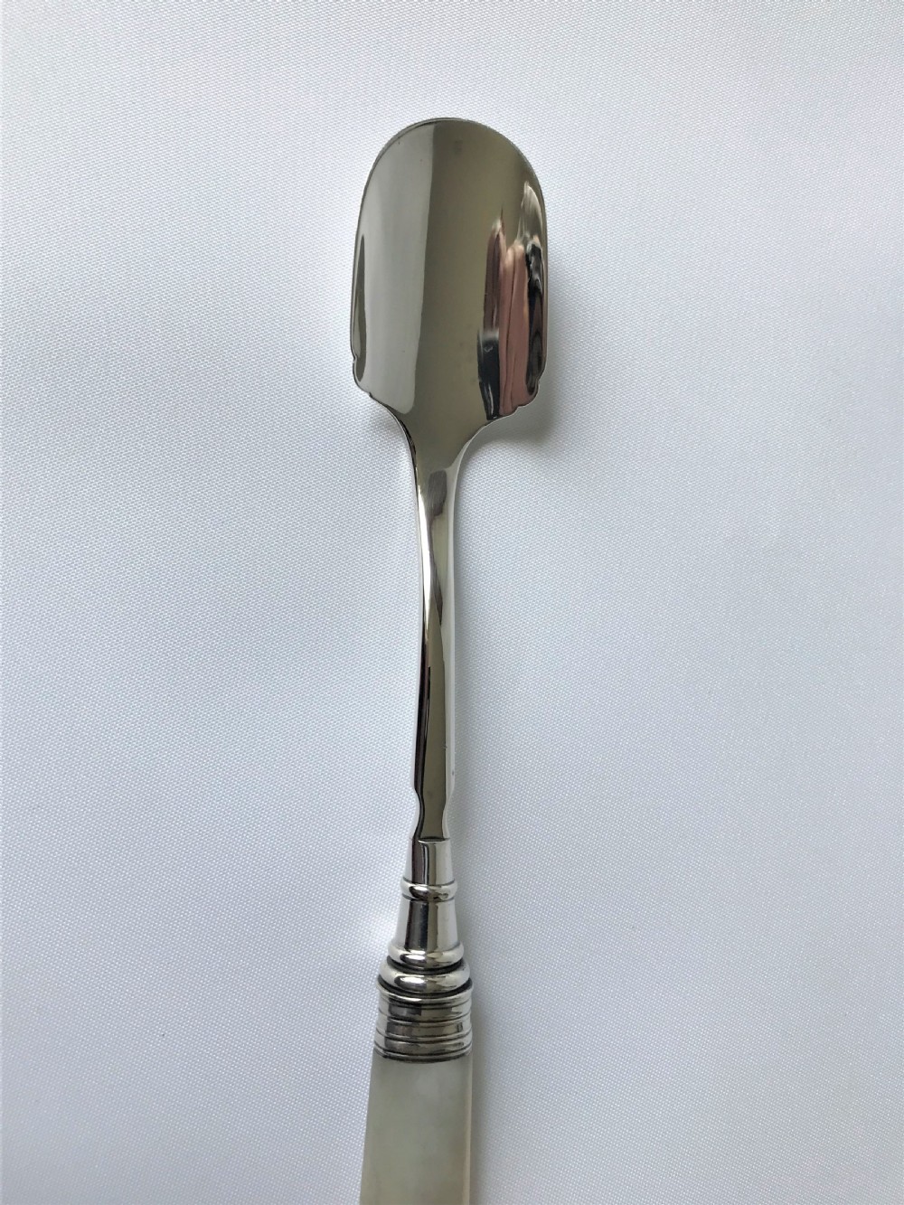 A rare Georgian silver & mother-of-pearl Stilton scoop View III