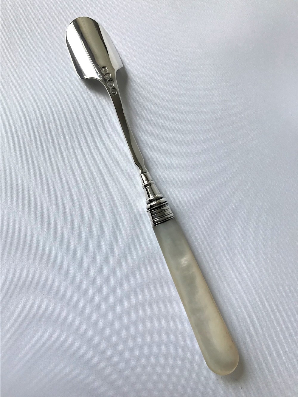 A rare Georgian silver & mother-of-pearl Stilton scoop View IV
